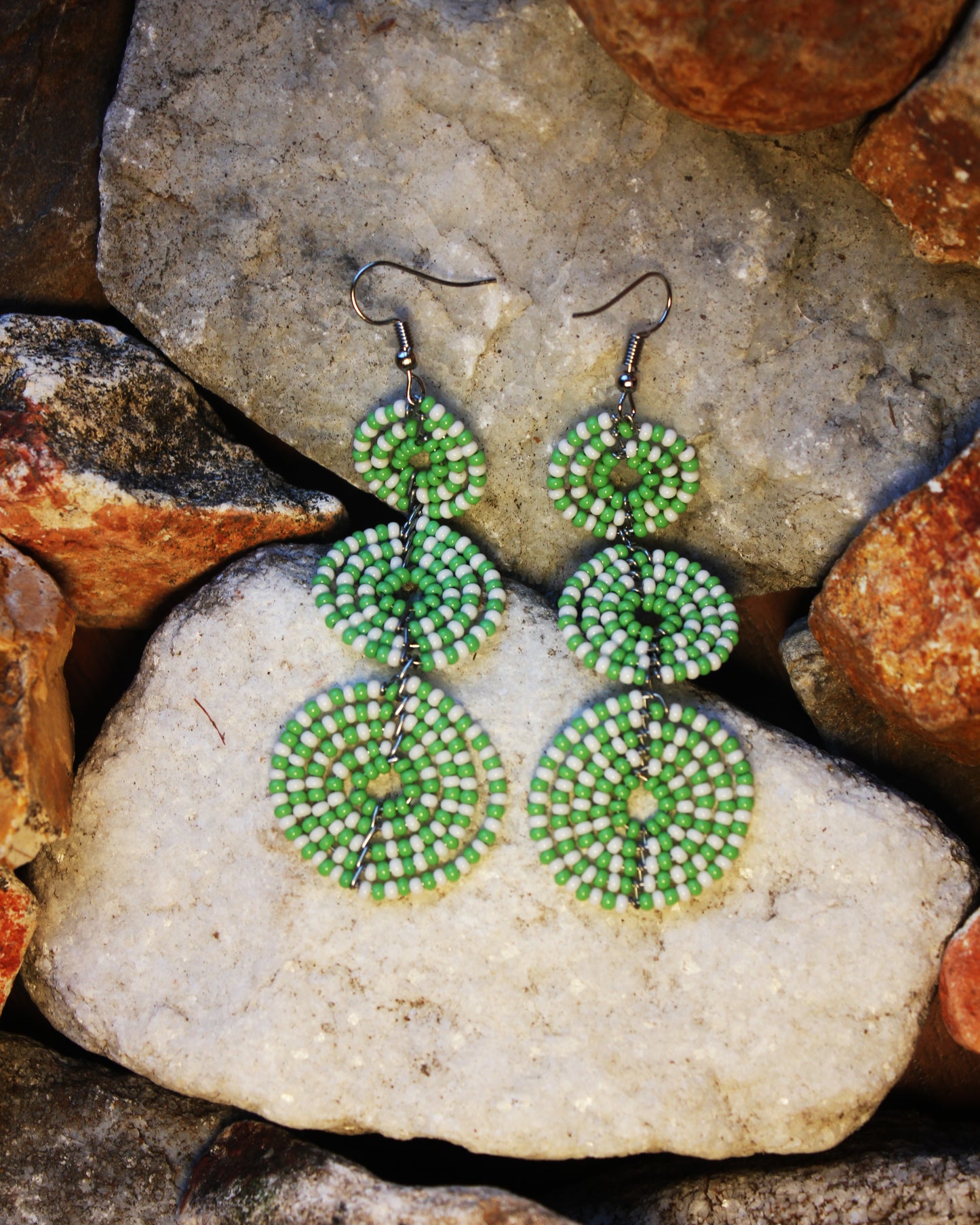Green And White Colored Maasai Handmade Beaded Ear Rings with sterling silver hooks.
