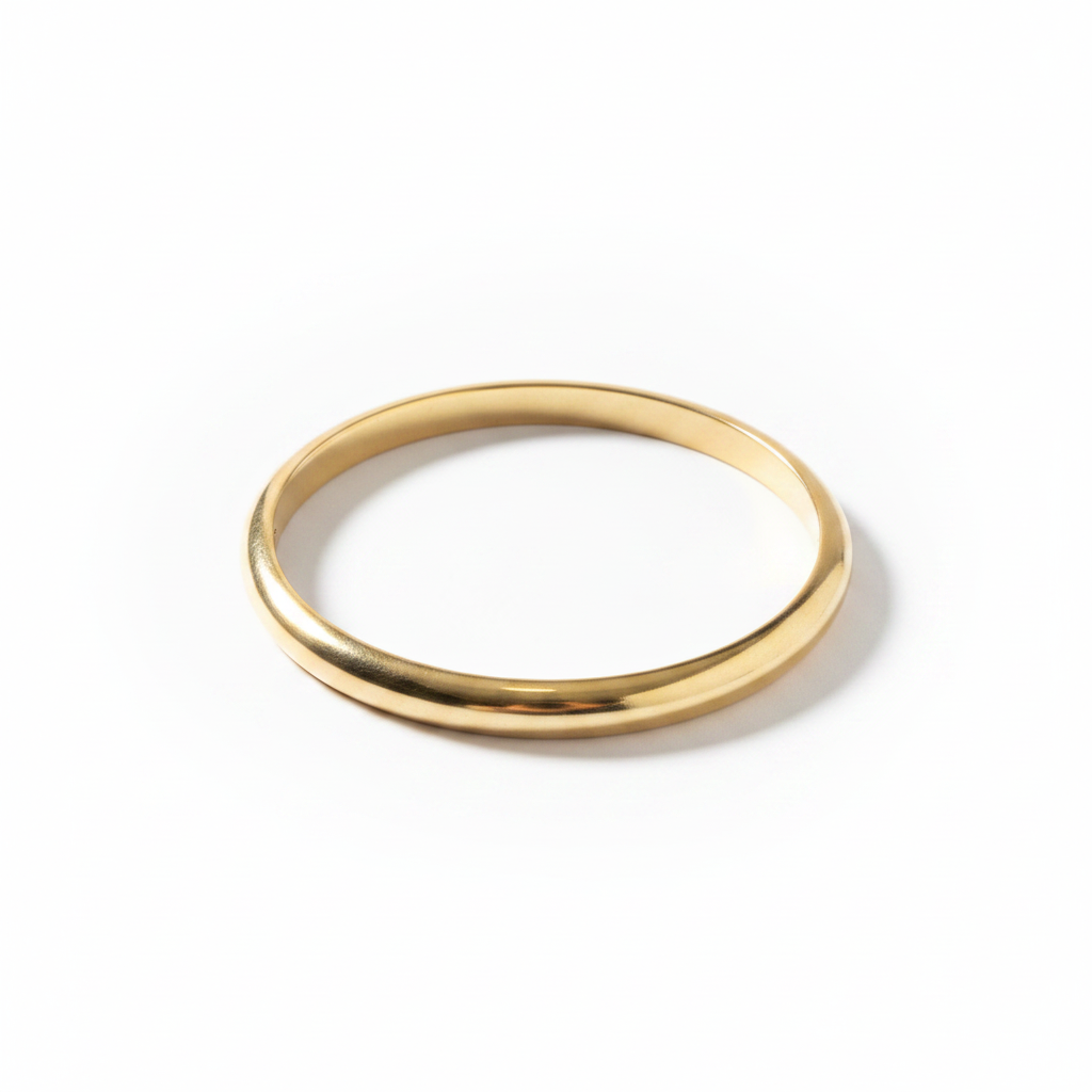 Pure brass bangle from Kenya on white background
