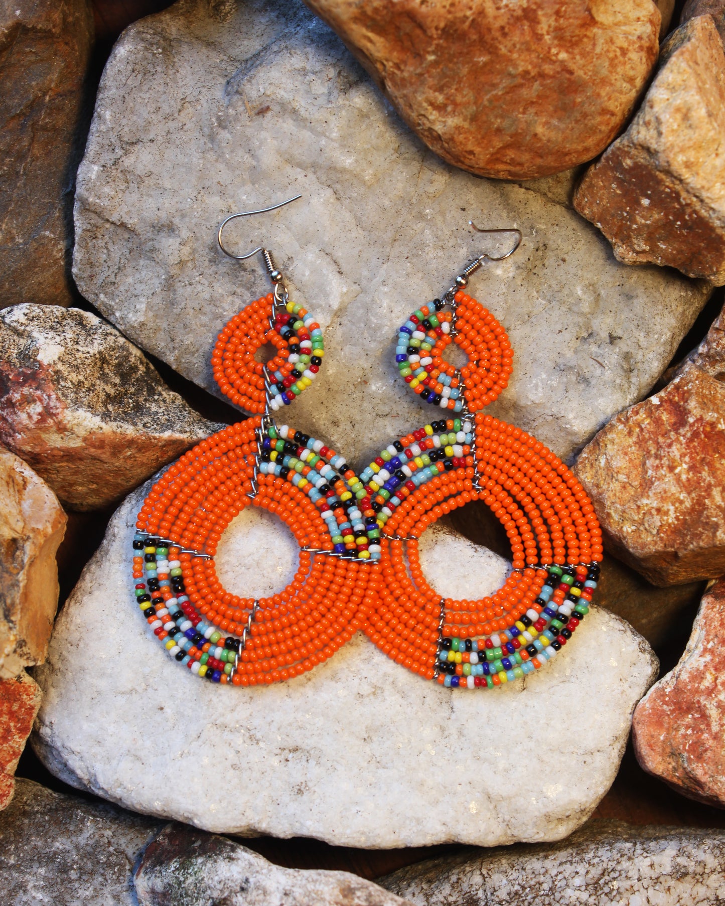 Orange And Multi-Colored Maasai Handmade Beaded Ear Rings with sterling silver hooks.
