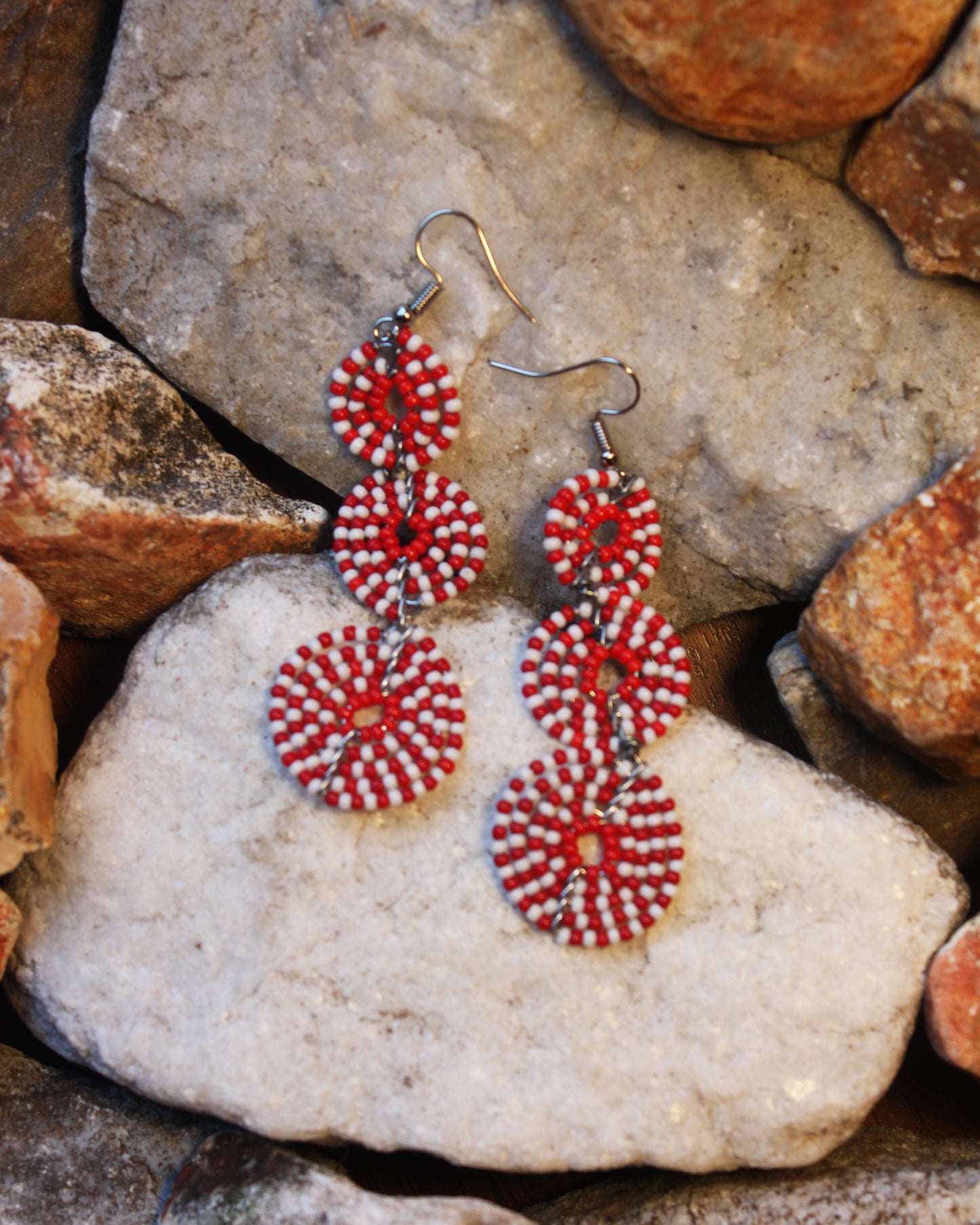 Red And White Colored Maasai Handmade Beaded Ear Rings with sterling silver hooks.