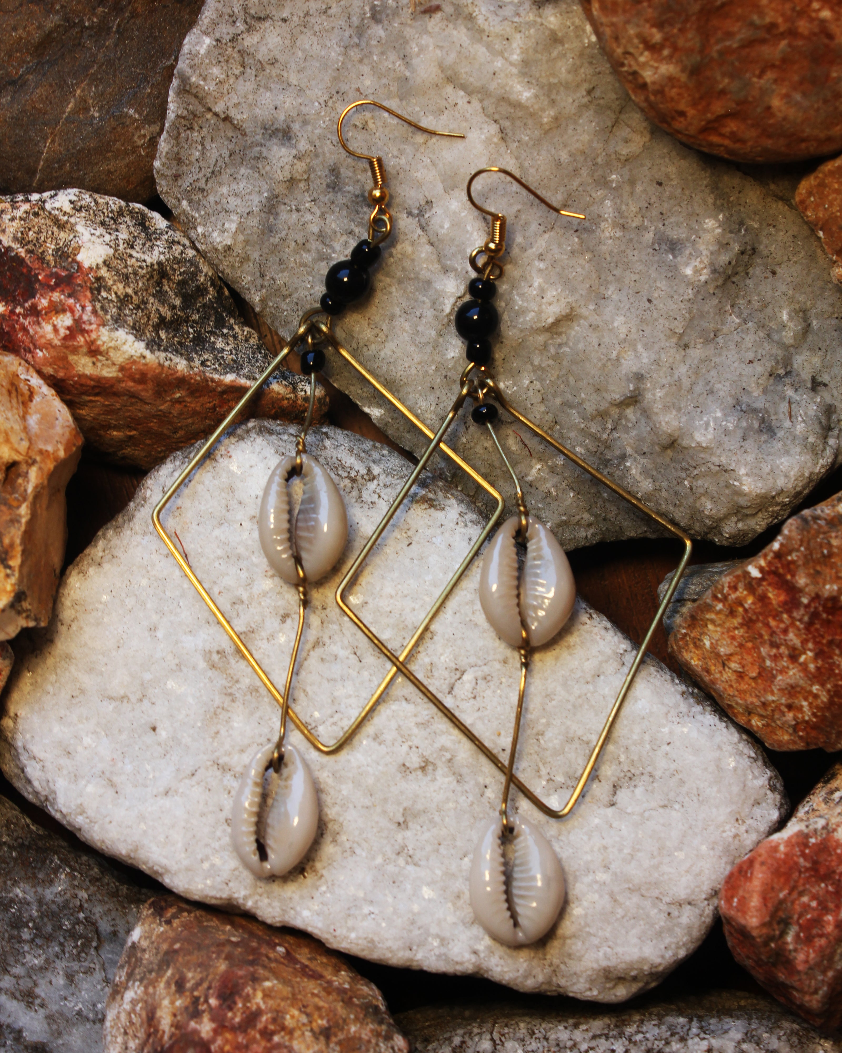 Brass Diamond-shaped earrings with a Cowry Shell Pendant and Black Beads