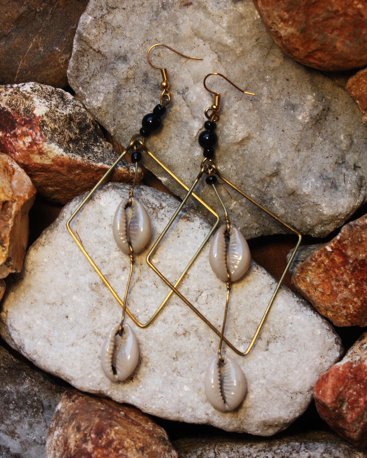 Brass Diamond-shaped earrings with a Cowry Shell Pendant and Black Beads
